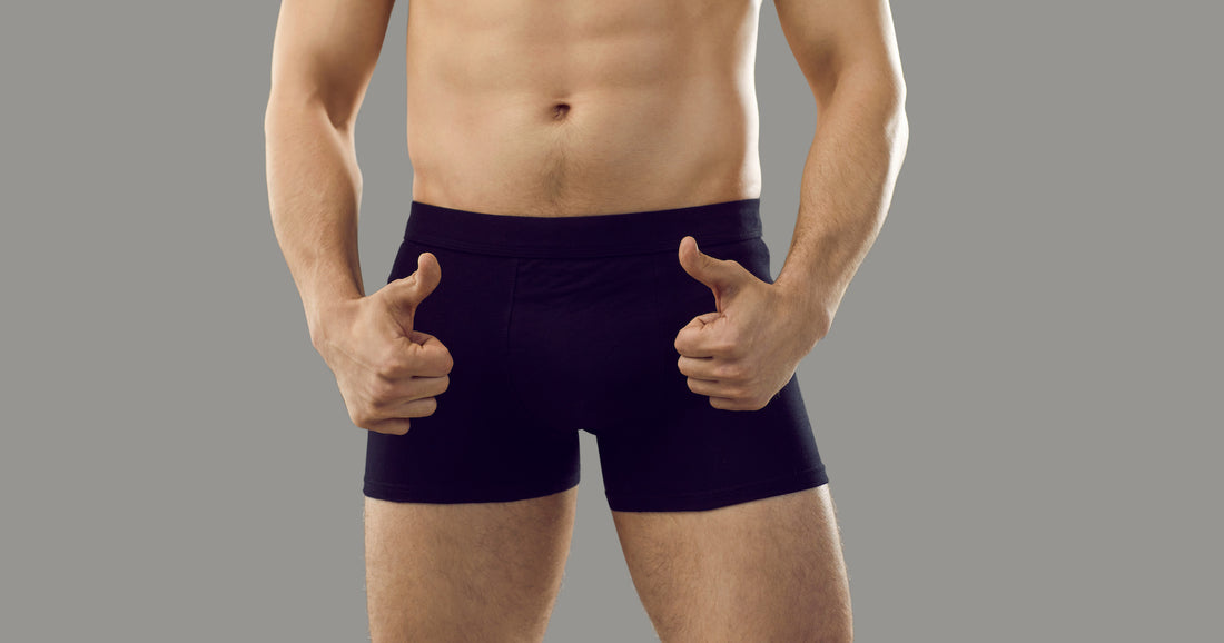 A man giving the thumbs up next to his groin area